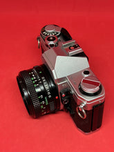 Load image into Gallery viewer, Canon AE-1 with 50mm f/1.8 lens