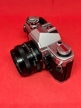 将图片加载到图库查看器，Canon AE-1 with 50mm f/1.8 Lens