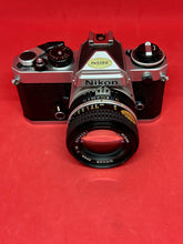 将图片加载到图库查看器，Nikon FE With 50mm f/1.4 Lens