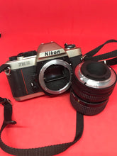 将图片加载到图库查看器，Nikon FM10 with Nikkor 35-70mm f/3.5-4.8 Zoom Lens