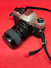 Load image into Gallery viewer, Nikon FM10 Outfit with Nikkor 35-70mm f/3.5-4.8 Zoom Lens