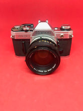 将图片加载到图库查看器，Canon AE-1 with 50mm f/1.4 Lens