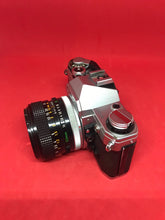 将图片加载到图库查看器，Canon AE-1 with 50mm f/1.4 Lens