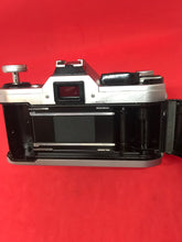 将图片加载到图库查看器，Canon AE-1 with 50mm f/1.4 Lens